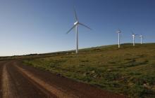 Giant wind turbines dot the landscape at the Darling Wind Power national demonstration project near Cape Town in a file photo. PHOTO BY REUTERS/Mike Hutchings