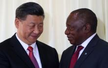 China's President Xi Jinping talks with South African President Cyril Ramaphosa after their media conference in Pretoria, South Africa, July 24, 2018. PHOTO BY REUTERS/Mike Hutchings