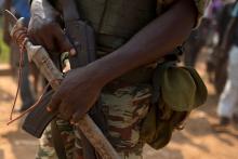 An African Union (AU) peacekeeping soldier holds a confiscated sword during a dispute between members of the local Christian community and ex-Seleka soldiers in Bangui, January 22, 2014. PHOTO BY REUTERS/Siegfried Modola