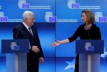European High Representative for Foreign Affairs Federica Mogherini shakes hands with Palestinian President Mahmoud Abbas in Brussels, Belgium, January 22, 2018. PHOTO BY REUTERS/Yves Herman