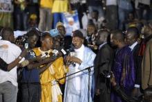 Senegal's former President Abdoulaye Wade speaks to a crowd upon his arrival in Dakar, April 26, 2014. PHOTO BY REUTERS/Mamadou Gomis