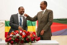 Eritrea's President Isaias Afwerki receives a key from Ethiopia's Prime Minister Abiy Ahmed during the inauguration ceremony marking the reopening of the Eritrean Embassy in Addis Ababa, Ethiopia, July 16, 2018. PHOTO BY REUTERS/Tiksa Negeri