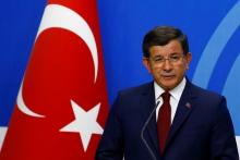 Turkish Prime Minister Ahmet Davutoglu speaks during a news conference at his ruling AK Party headquarters in Ankara, Turkey, May 5, 2016. PHOTO BY REUTERS/Umit Bektas