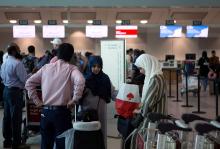 People line up to check in for a flight from Toronto Pearson International Airport to Riyadh, Saudi Arabia, in Toronto, Canada, August 10, 2018. PHOTO BY REUTERS/Chris Donovan