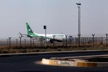 An Iraqi Airways plane is seen at the Erbil International Airport in Erbil, Iraq, September 29, 2017. PHOTO BY REUTERS/Azad Lashkari