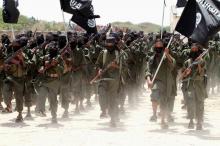 New recruits of Somalia's al-Qaeda linked al Shabaab militia march during a passing out parade at a military training base in Afgoye, west of Mogadishu, Somalia, February 17, 2011. PHOTO BY REUTERS/Feisal Omar
