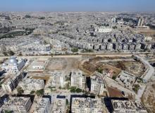 A general view taken with a drone shows a road separating Aleppo's government-controlled areas from the rebel-held ones in Syria, October 20, 2016. PHOTO BY REUTERS/Abdalrhman Ismail