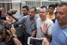 U.S. pastor Andrew Brunson reacts as he arrives at his home after being released from the prison in Izmir, Turkey July 25, 2018. PHOTO BY REUTERS/Demiroren News Agency/DHA