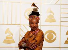 Angelique Kidjo poses with the award for Best World Music Album for "Sings" during the 58th Grammy Awards in Los Angeles, California February 15, 2016. REUTERS/Lucy Nicholson