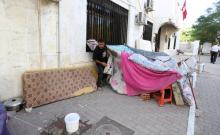 Anis Nasralli, 32, an unemployed graduate from the city of Kasserine, takes part in a sit-in protest near the Ministry of Vocational Training and Employment demanding the government to provide them with job opportunities in Tunis, Tunisia, October 27, 2016. PHOTO BY REUTERS/Zoubeir Souissi