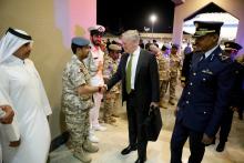 U.S. Defense Secretary James Mattis (C) is greeted by military dignitaries as he arrives at Al Udeid Air Base in Doha, Qatar, April 21, 2017. PHOTO BY REUTERS/Jonathan Ernst