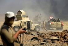 Members of Iraqi army are seen during the war between Iraqi army and Shi'ite Popular Mobilization Forces (PMF) against the Islamic State militants in al-Ayadiya, northwest of Tal Afar, Iraq, August 28, 2017. PHOTO BY REUTERS/Thaier Al-Sudani