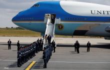U.S. President Donald Trump and First Lady Melania Trump arrive aboard Air Force One, for their first official visit to Britain, at Stansted Airport, Britain, July 12, 2018. PHOTO BY REUTERS/Henry Nicholls