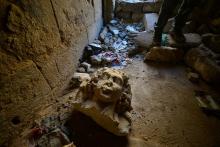 A destroyed artifact is seen at the ancient city of Hatra, south of Mosul, Iraq, April 27, 2017. PHOTO BY REUTERS/Stringer