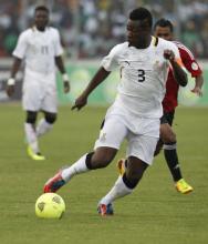 Asamoah Gyan of Ghana controls the ball during their World Cup 2014 African zone qualifying soccer match against Egypt at the Baba Yara Sports Stadium in Kumasi