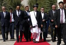 Afghanistan's new President Ashraf Ghani Ahmadzai (C) arrives for his inauguration as president in Kabul