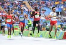 Andres Arroyo (PUR) competes in a men's 800m heat against Ferguson Cheruiyot Rotich (KEN, middle) and Adam Kszczot (POL, right) at Estadio Olimpico Joao Havelange during the 2016 Rio Summer Olympic Games, August 12, 2016. PHOTO BY USA TODAY Sports/James Lang