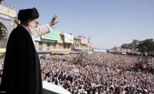 Iran's Supreme Leader Ayatollah Ali Khamenei waves to the crowd in the holy city of Qom, 120 km (75 miles) south of Tehran, October 19, 2010. PHOTO BY REUTERS/Khamenei.ir