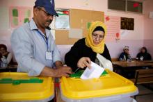 A Jordanian woman casts her ballot at a polling station for local and municipal elections in Amman, Jordan, August 15, 2017. PHOTO BY REUTERS/Muhammad Hamed