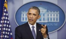 U.S. President Barack Obama answers a question after his end of the year press conference in the briefing room of the White House in Washington, December 19, 2014. PHOTO BY REUTERS/Larry Downing