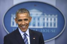 U.S. President Barack Obama smiles as he speaks to journalists during his last news conference of the year at the White House in Washington, U.S., December 16, 2016. PHOTO BY REUTERS/Carlos BarriaBy Roberta Rampton and Jeff Mason