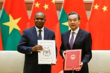 China's Foreign Minister Wang Yi and Burkina Faso Foreign Minister Alpha Barry attend a signing ceremony establishing diplomatic relations between the two countries in Beijing, China, May 26, 2018. PHOTO BY REUTERS/Thomas Peter