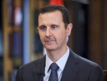 Syria's President Bashar al-Assad speaks during an interview with Venezuelan state television TeleSUR in Damascus, in this handout photograph distributed by Syria's national news agency SANA, September 26, 2013. PHOTO BY REUTERS/SANA/Handout via Reuters
