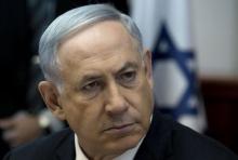 Israeli Prime Minister Benjamin Netanyahu attends the weekly cabinet meeting at his office in Jerusalem, April 19, 2015. PHOTO BY REUTERS/Menahem Kahana