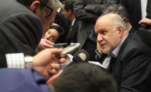 Iranian Oil Minister Bijan Zanganeh talks to journalists before a meeting of OPEC oil ministers at OPEC's headquarters in Vienna, December 4, 2013. PHOTO BY REUTERS/Heinz-Peter Bader