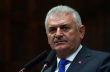 Turkey's Prime Minister Binali Yildirim addresses members of parliament from his ruling AK Party (AKP) during a meeting at the Turkish parliament in Ankara, Turkey, October 4, 2016. PHOTO BY REUTERS/Umit Bektas