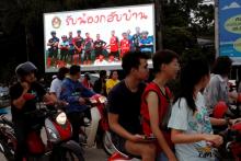 A board showing "Welcome home, boys", is seen after rescue effort has begun for the 12 schoolboys and their soccer coach trapped in Tham Luang cave, in Chiang Rai, Thailand, July 9, 2018. PHOTO BY REUTERS/Tyrone Siu