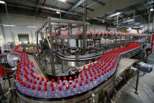 LONDON (Reuters) - Global bottled water giants are ramping up trials of easily recyclable aluminum cans to replace plastic that pollutes the world's seas. Sound like a slam-dunk for the environment? Not entirely.  Aluminum cans might indeed mean less ocean waste, but they come with their own eco-price: the production of each can pumps about twice as much carbon into the atmosphere as each plastic bottle.  French group Danone <DANO.PA> has become the latest company to make a move, telling Reuters it had star