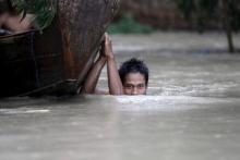 NYAUNGDON, Myanmar (Thomson Reuters Foundation) - Authorities are racing to clean contaminated water sources in flood-hit parts of Myanmar, while distributing bottled water, chlorine powder and purification tablets as they struggle with diarrhea outbreaks.  Torrential rains since late June triggered floods and landslides across central and western Myanmar, killing more than 100 people and affecting 1.3 million, according to the U.N. Office for the Coordination of Humanitarian Affairs.  In four hard-hit stat
