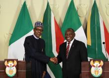 Nigeria's President Muhammadu Buhari shakes hands with his South African counterpart Cyril Ramaphosa during a news conference after a meeting, in Pretoria, South Africa, October 3, 2019. PHOTO BY REUTERS/Siphiwe Sibeko