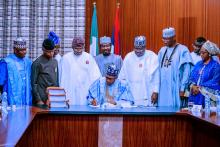 Nigeria's President Muhammadu Buhari approves 2020 budget in Abuja, Nigeria, December 17, 2019. PHOTO BY REUTERS/Nigeria Presidency