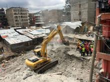 Rescue workers use a bulldozer as they continue to search for survivors in Huruma neighbourhood in the rubble of a six-storey building that collapsed in Nairobi, Kenya, May 5, 2016. PHOTO BY REUTERS/Thomas Mukoya