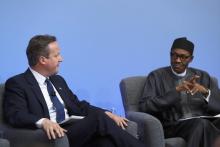 Nigerian President Muhammadu Buhari listens as British Prime Minister Cameron opens the international anti-corruption summit on May 12, 2016 in London, England. PHOTO BY REUTERS/Dan Kitwood