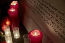 Candles are outside the Medecins Sans Frontieres (MSF) headquarters in Geneva, Switzerland, October 7, 2015. PHOTO BY REUTERS/Denis Balibouse