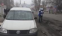 Members of the Organisation for Security and Cooperation in Europe (OSCE) look at the remains of a shell on a street after a shelling by pro-Russian rebels of a residential sector in Mariupol, eastern Ukraine, January 24, 2015. PHOTO BY REUTERS/Nikolai Ryabchenko