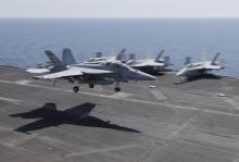 A F/A-18E/F Super Hornets of Strike Fighter Attack Squadron 211 (VFA-211) lands on the flight deck of the USS Theodore Roosevelt (CVN-71) aircraft carrier in the Gulf June 18, 2015. PHOTO BY REUTERS/Hamad I Mohammed