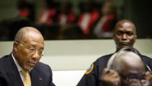 Former Liberian President Charles Taylor appears in court at the Special Court for Sierra Leone for his appeal judgment at The Hague, September 26, 2013. PHOTO BY REUTERS/Koen van Weel