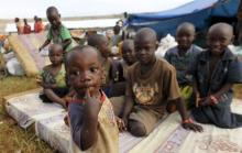 Burundian refugee children pose for a photograph at the Lake Tanganyika stadium in Kigoma western Tanzania, May 19, 2015. PHOTO BY REUTERS/Thomas Mukoya