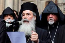 Greek Orthodox Patriarch of Jerusalem, Theophilos III, speaks during a news conference with other church leaders in front of the closed doors of the Church of the Holy Sepulchre in Jerusalem's Old City, February 25, 2018. PHOTO BY REUTERS/Amir Cohen