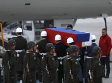 Flag-wrapped coffin of late Russian Ambassador to Turkey Andrei Karlov is carried to a plane during a ceremony at Esenboga airport in Ankara, Turkey, December 20, 2016. PHOTO BY REUTERS/Umit Bektas