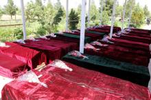 Coffins containing the bodies of Afghan national Army (ANA) soldiers killed in April 21's attack on an army headquarters are lined up in Mazar-i-Sharif, northern Afghanistan April 22, 2017. PHOTO BY REUTERS/Presidential Palace 