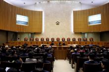 Judges of South Korea's Supreme Court sit as Lee Choon-shik (obscured), victim of wartime forced labor during the Japanese colonial period, attends to hear the court ruling in Seoul, South Korea, October 30, 2018. PHOTO BY REUTERS/Kim Hong-Ji