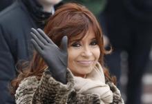Argentina's President Cristina Fernandez waves as she takes part in a wreath laying ceremony at the Tomb of the Unknown Soldier by the Kremlin walls in central Moscow, April 23, 2015. PHOTO BY REUTERS/Sergei Karpukhin