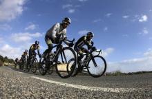 Eritrean cyclist Natnael Berhane (L) and Adrien Niyonshuti of Rwanda lead fellow MTN-Qhubeka team team members during a training ride on the Spanish island of Mallorca January 24, 2015. PHOTO BY REUTERS/Enrique Calvo