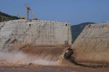 Water flows through Ethiopia's Grand Renaissance Dam as it undergoes construction work on the river Nile in Guba Woreda, Benishangul Gumuz Region, Ethiopia. PHOTO BY REUTERS/Tiksa Negeri