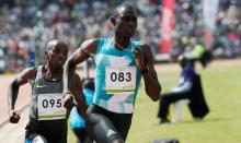 David Rudisha (R) competes. PHOTO BY REUTERS/Thomas Mukoya